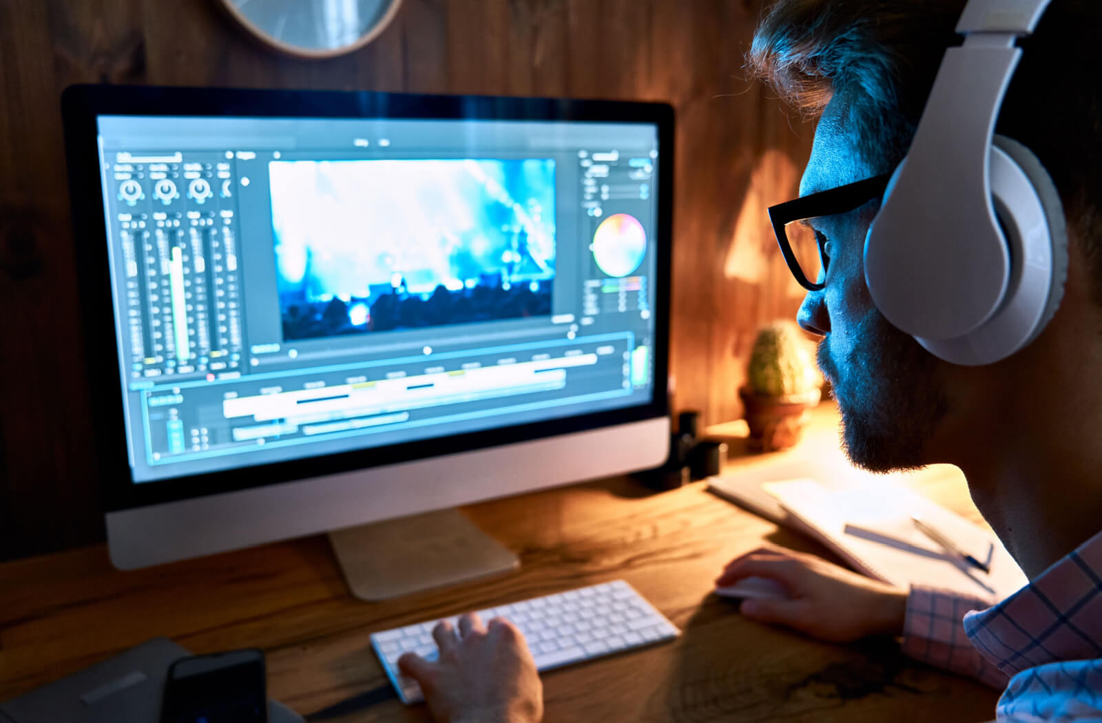 A man with eye strain is working on the computer